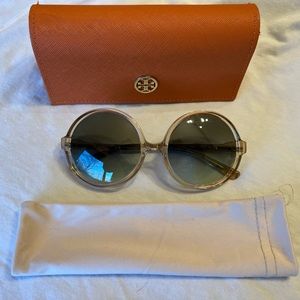 Tory Burch Round Sunglasses.Translucent acetate with green gradient lenses.